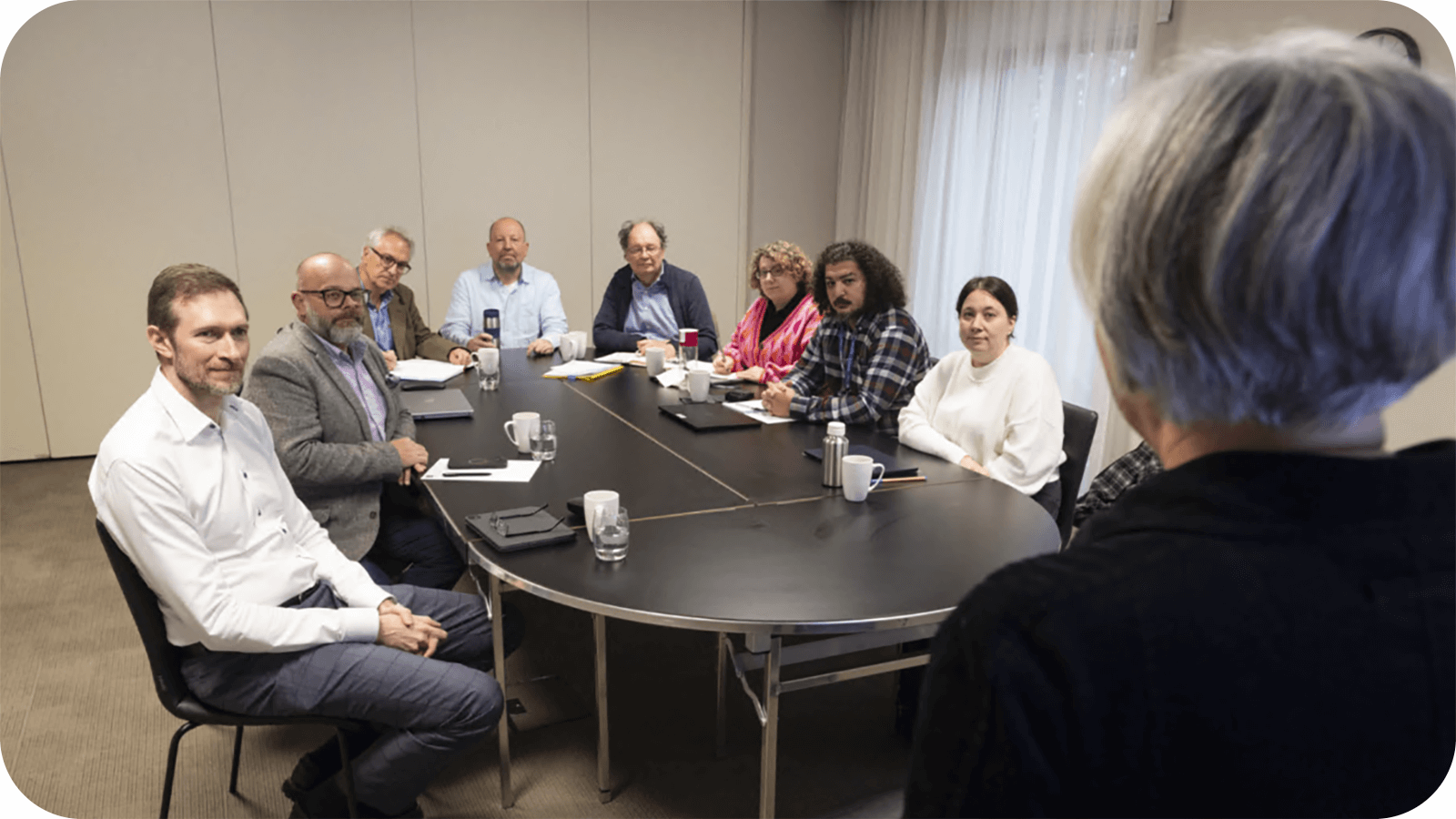 Board members sat around a table